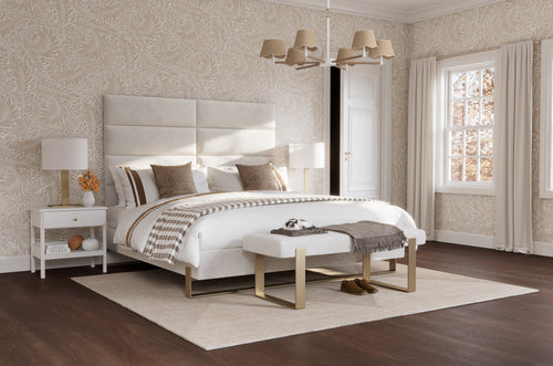 A neatly arranged contemporary bedroom with a vantpanel layout, plush bedding, and tasteful decor.