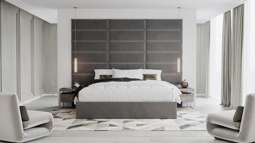 Modern bedroom with a large bed, geometric-patterned floor, and two chairs in a monochromatic color scheme featuring an Austin-inspired layout featuring the Vantpanel Inspiration 2.