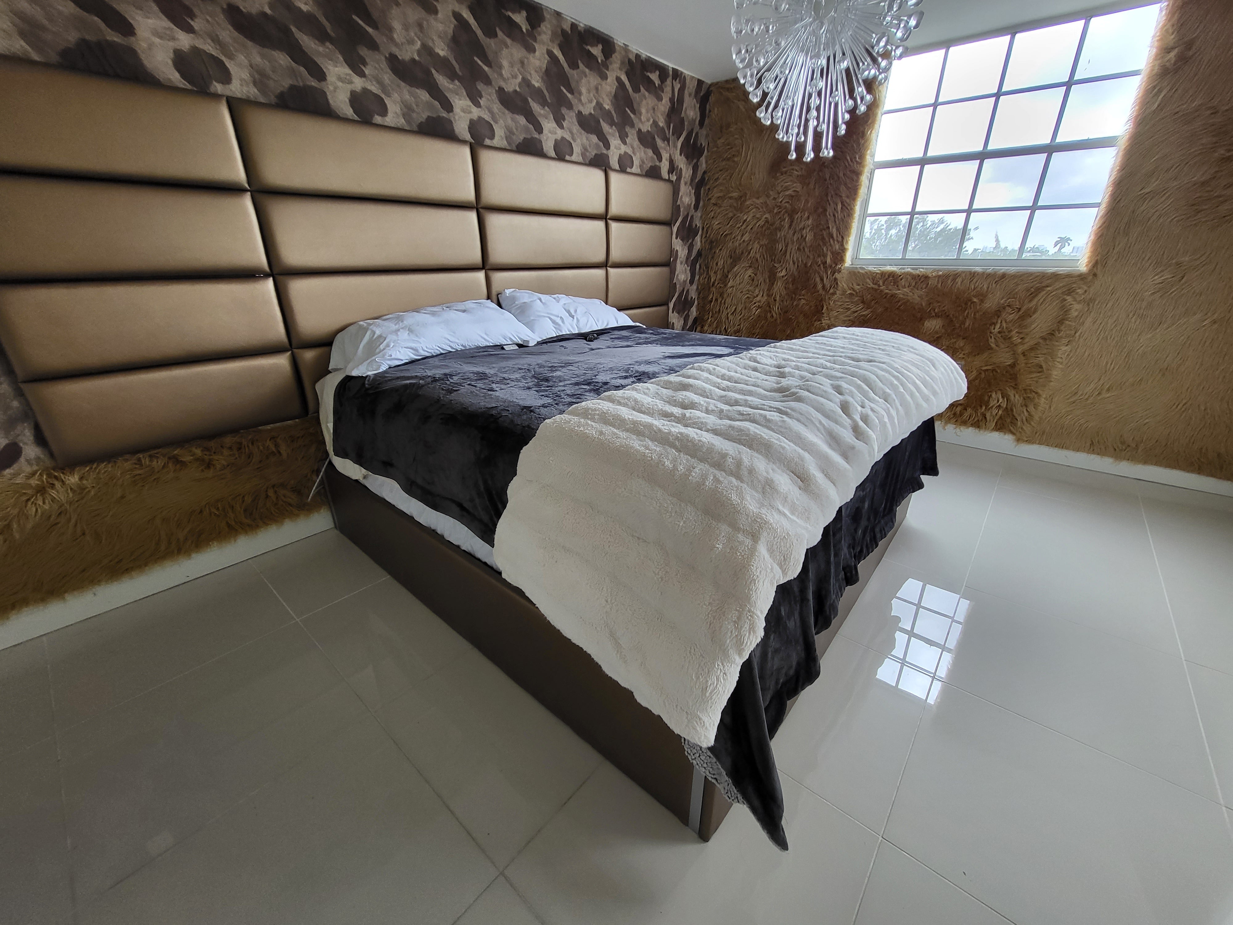 Miami Beach bedroom. Platform bed and wall panels.